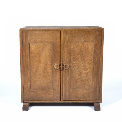 Lot 735 - Cotswold School Arts and Crafts cupboard oak,...