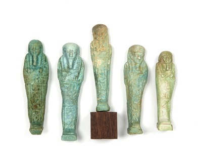 Lot 253 - A group of five Egyptian Shabtis the largest...
