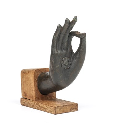 Lot 259 - A Bronze hand of Buddha Cast with thin and...
