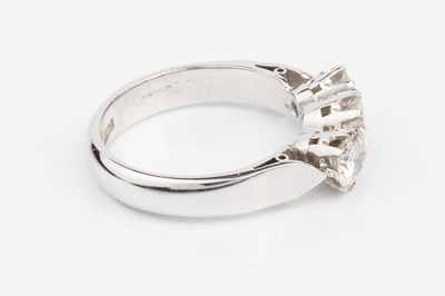 Lot 160 - A diamond three stone ring, the graduated...
