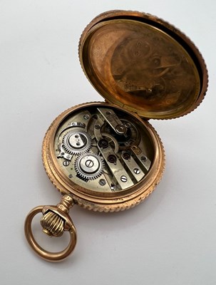 Lot 238 - A hunter pocket watch, the profusely decorated...