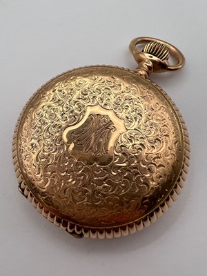 Lot 238 - A hunter pocket watch, the profusely decorated...