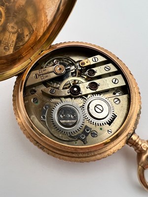 Lot 238 - A hunter pocket watch, the profusely decorated...