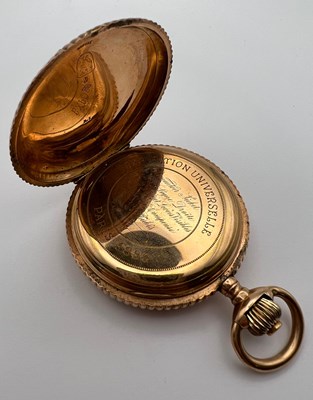 Lot 238 - A hunter pocket watch, the profusely decorated...