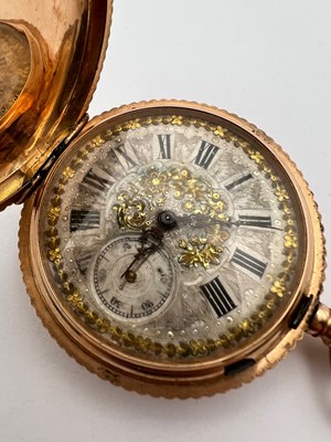 Lot 238 - A hunter pocket watch, the profusely decorated...