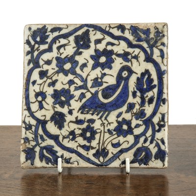 Lot 570 - Blue and white pottery tile Zand, Iran, late...