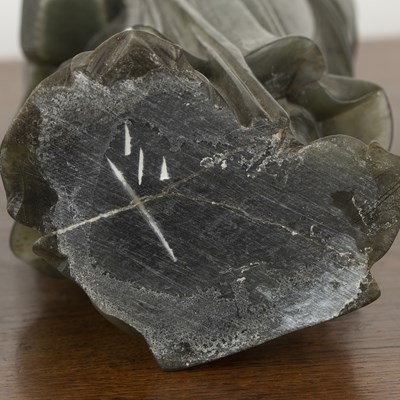 Lot 224 - Green soapstone carved model of Guanyin...