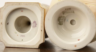 Lot 312 - Two Royal Worcester blush ivory vases one on a...