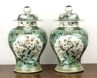 Lot 111 - Pair of biscuit baluster vases and covers...