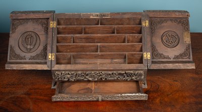 Lot 86 - An Indian carved hardwood stationery box