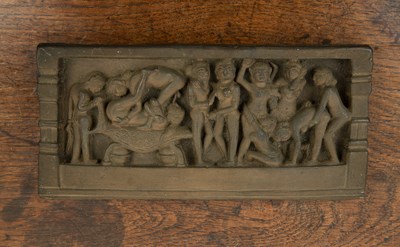 Lot 513 - Relief moulded erotic plaster panel Indian in...