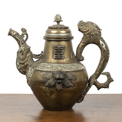 Lot 311 - Brass and embossed metal teapot Tibetan with a...