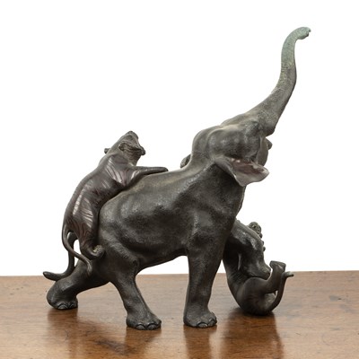 Lot 511 - Model bronze elephant and two tigers Japanese,...