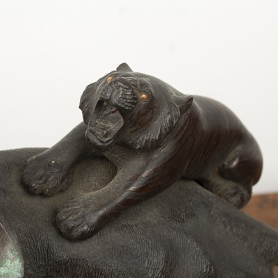 Lot 511 - Model bronze elephant and two tigers Japanese,...
