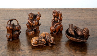 Lot 514 - Five carved wood netsukes Japanese, 20th...