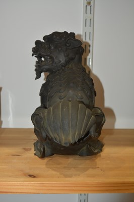 Lot 323 - Bronze model of a temple dog Chinese,...