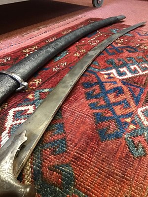 Lot 177 - A 19th century Indo-Persian sword the steel...
