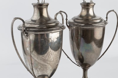 Lot 577 - A pair of George V silver twin handled trophy...