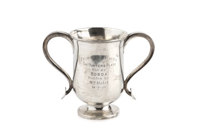 Lot 580 - An Irish silver twin handled trophy cup, with...