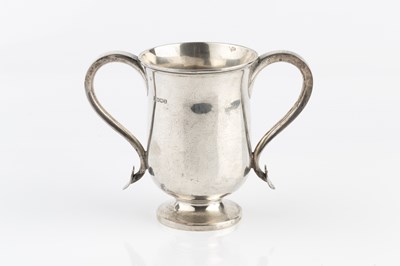 Lot 580 - An Irish silver twin handled trophy cup, with...