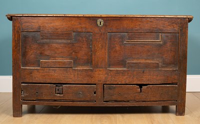 Lot 414 - An 18th century oak mule chest