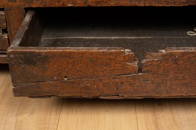 Lot 414 - An 18th century oak mule chest