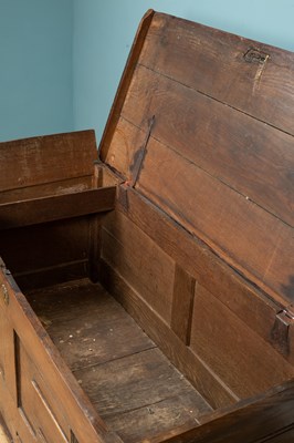 Lot 414 - An 18th century oak mule chest