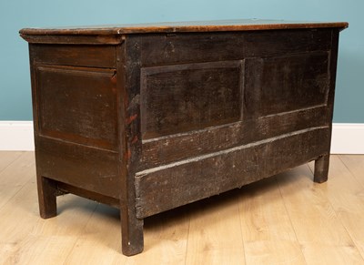 Lot 414 - An 18th century oak mule chest