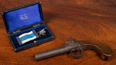 Lot 132 - A 19th Century muff pistol