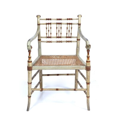 Lot 236 - A Regency painted faux bamboo open armchair...