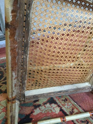 Lot 236 - A Regency painted faux bamboo open armchair...