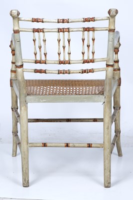 Lot 236 - A Regency painted faux bamboo open armchair...