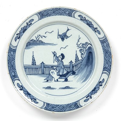 Lot 248 - A mid 18th century English Delft blue and...