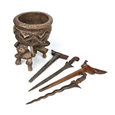 Lot 174 - A 19th century Javanese Kris with a carved...