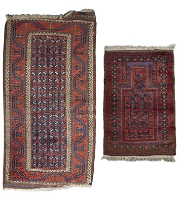 Lot 289 - An antique Baluch rug with a blue and red...