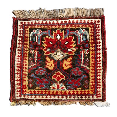 Lot 293 - An antique Kurdish Bagface with an orange and...