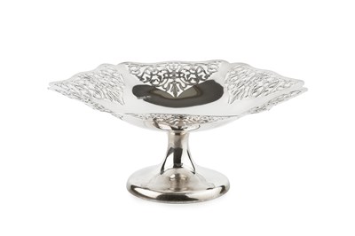 Lot 179 - A silver hexagonal tazza, the shaped borders...