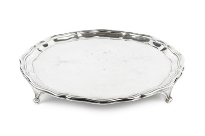 Lot 182 - A George VI silver salver, with shaped border...