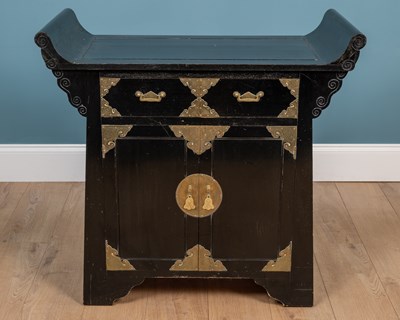 Lot 81 - An Oriental ebonised camphor wood side cabinet