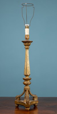 Lot 404 - An antique carved giltwood Italian table lamp