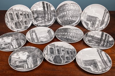 Lot 563 - A collection of eleven Fornasetti plates depicting views of Rome