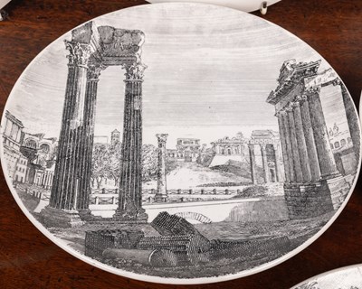 Lot 563 - A collection of eleven Fornasetti plates depicting views of Rome