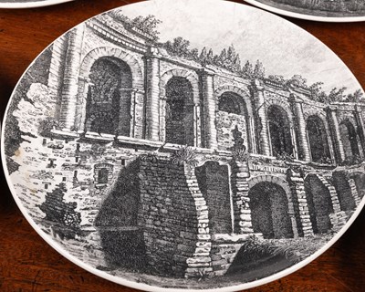 Lot 563 - A collection of eleven Fornasetti plates depicting views of Rome