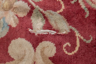 Lot 1048 - A red ground Kidderminster Axminster carpet