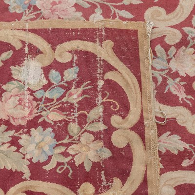 Lot 1048 - A red ground Kidderminster Axminster carpet