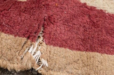 Lot 1048 - A red ground Kidderminster Axminster carpet