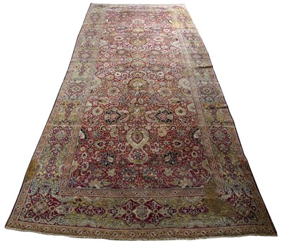 Lot 302 - An antique Persian red and yellow ground...