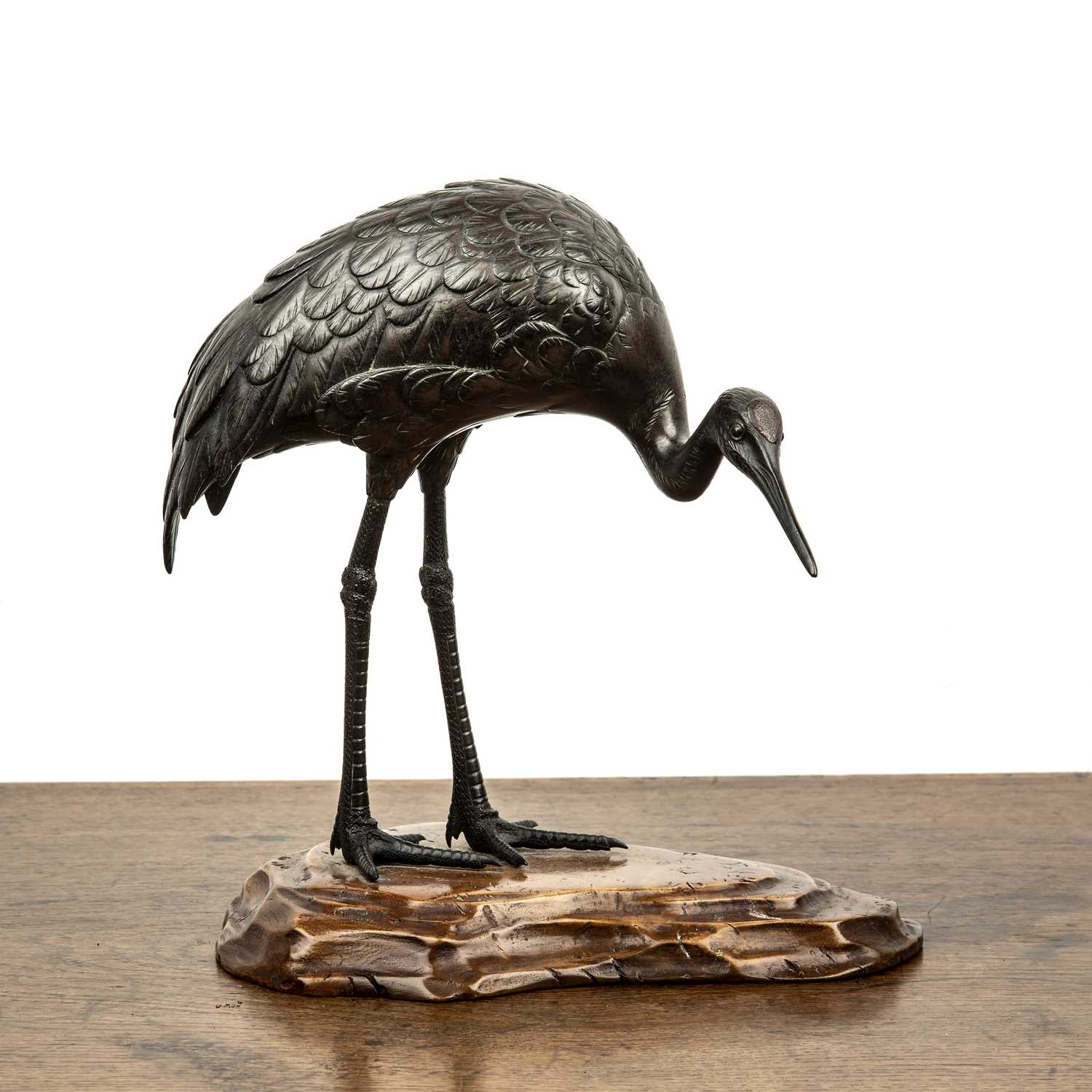 Lot 577 - Bronze model of a crane Japanese, Meiji period...