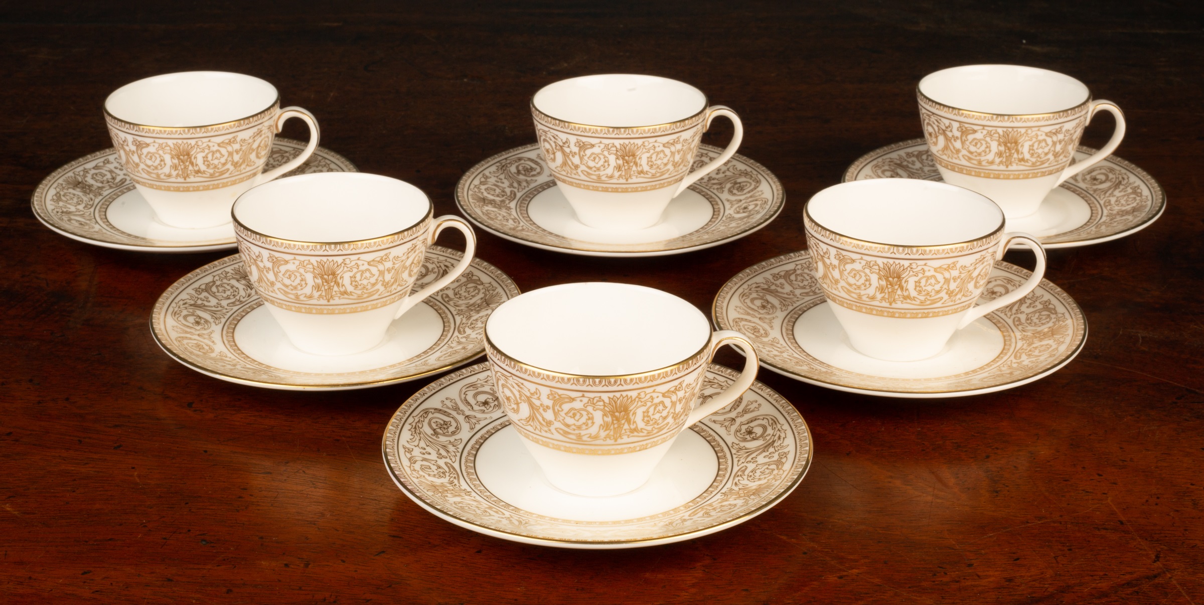 Lot 55 A Minton Haddon Hall china tea service set;