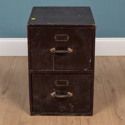 Lot 333 - An early 20th century dark maroon leatherette covered filing cabinet